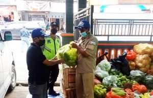 Polsek Dau Salurkan Bantuan Terdampak Erupsi Semeru di Pronojiwo