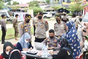 Polres dan Pemda Kuansing Gelar Vaksinasi di Pasar Tradisional Berbasis Modern