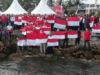 Pengibaran Bendera Merah Putih di Permukaan Laut Dihadiri Gubernur Sulbar dan Danrem 142/Tatag