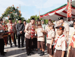 Pj Bupati OKU Melakukan Upacara Peringatan Hari Pramuka ke-61 di Taman Kota Baturaja