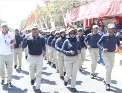 Pj Bupati Bangkalan  Ikut Serta Memeriahkan Gerak Jalan