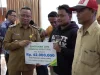 Pemkab Tabalong Serahkan Santunan Jamsos Rp42 Juta, Pastikan Perlindungan Pekerja Rentan